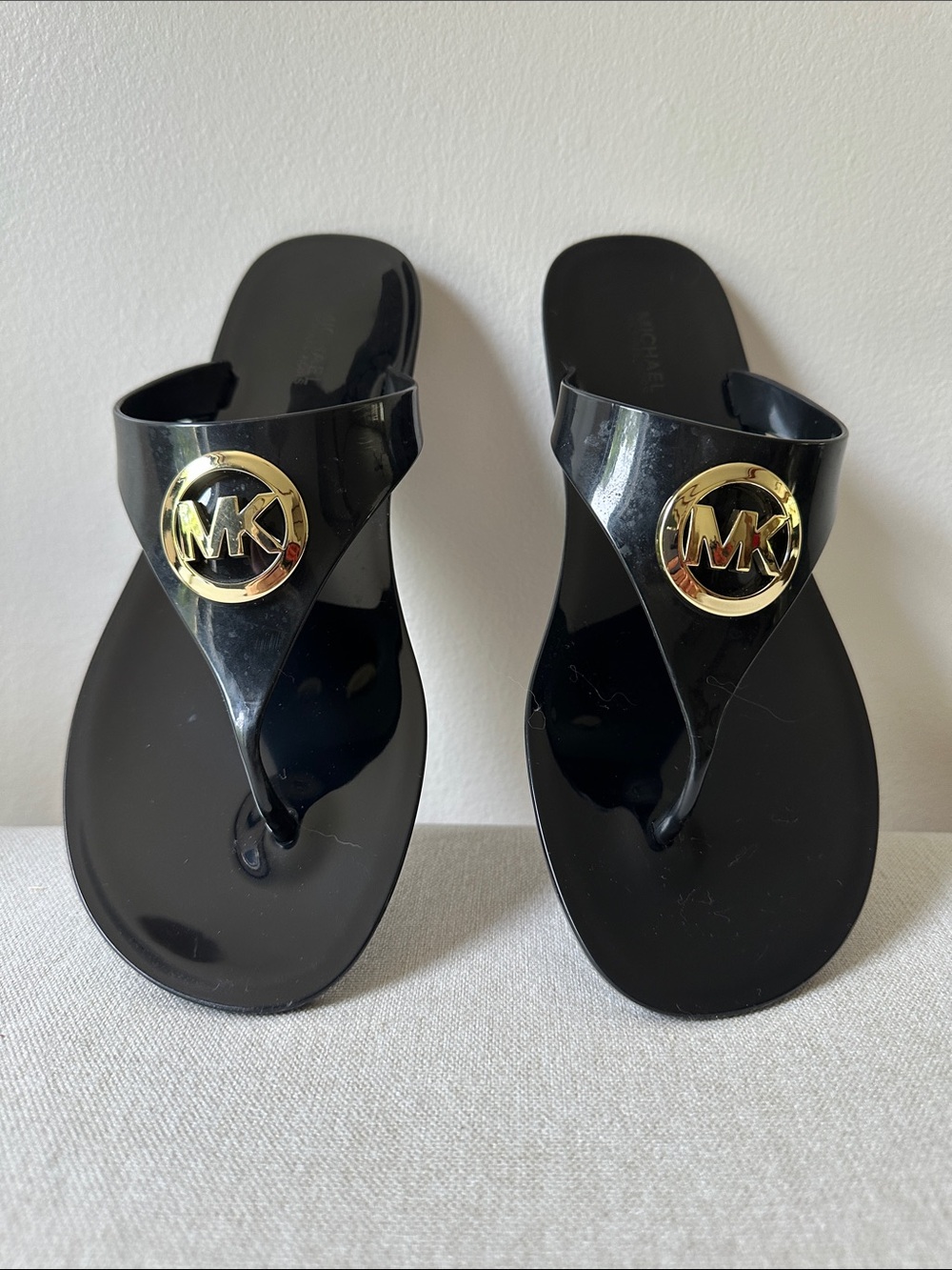 Michael Kors Black Jelly Flip Flops with Gold MK Emblem 9M